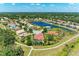 Aerial view of a single-Gathering home in a lovely community with a beautiful pond at 12838 Daisy Pl, Bradenton, FL 34212