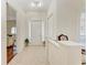 Bright foyer featuring tile flooring and a view into the living spaces at 12838 Daisy Pl, Bradenton, FL 34212
