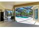 Beautiful screened-in pool area with ample space for lounging and enjoying the outdoors in a private setting at 12838 Daisy Pl, Bradenton, FL 34212