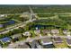Beautiful aerial view of home, water features, and manicured landscaping in a well-maintained neighborhood at 13116 Bliss Loop, Bradenton, FL 34211
