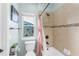 Bathroom with a shower-tub combination with tile surround and fixtures at 13116 Bliss Loop, Bradenton, FL 34211
