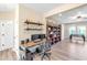 Versatile bonus room featuring a computer desk and a foosball table with ample space at 13116 Bliss Loop, Bradenton, FL 34211