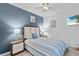 Comfortable bedroom featuring a queen-size bed, soft lighting, and soothing color palette for rest at 14184 Heritage Landing Blvd # 513, Punta Gorda, FL 33955
