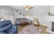 Spacious living room featuring comfortable furniture and a decorative area rug at 14519 Catalina Cir, Seminole, FL 33776