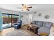 Stylish living room with patio access and comfortable seating at 14519 Catalina Cir, Seminole, FL 33776