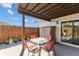 Inviting patio area with outdoor seating and views of the home's exterior at 14519 Catalina Cir, Seminole, FL 33776