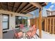 Inviting patio area with outdoor seating and views of the home's exterior at 14519 Catalina Cir, Seminole, FL 33776