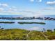 Breathtaking waterfront view of oceanfront buildings and lush islands from the building's perch at 14519 Catalina Cir, Seminole, FL 33776