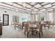 Conference room featuring large tables, modern seating, and ample lighting for meetings at 17576 Holly Well Ave, Wimauma, FL 33598