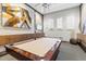 Well-appointed game room featuring a pool table, decorative brick wall, and modern lighting at 17576 Holly Well Ave, Wimauma, FL 33598