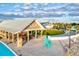 Outdoor Lagoon Bar offers residents refreshments with a lakeside view and relaxing ambiance at 17576 Holly Well Ave, Wimauma, FL 33598