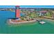 Beautiful aerial view of the lighthouse, lake, and community at 17732 Wayside Bnd, Punta Gorda, FL 33982