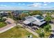 Aerial view of waterfront community with green spaces and multiple buildings at 17732 Wayside Bnd, Punta Gorda, FL 33982