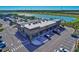 Aerial view of a commercial building with a bank and retail spaces with ample parking at 17732 Wayside Bnd, Punta Gorda, FL 33982