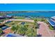 Beautiful aerial view of the community featuring a park with solar panels and palm trees along the waterfront at 17732 Wayside Bnd, Punta Gorda, FL 33982