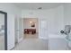 Spacious bedroom with french doors leading to the dining area at 17732 Wayside Bnd, Punta Gorda, FL 33982