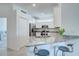 Kitchen with stainless steel appliances, granite countertops, breakfast bar and seating at 17732 Wayside Bnd, Punta Gorda, FL 33982