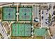 Aerial view of community tennis and bocce ball courts, basketball court, and parking at 17732 Wayside Bnd, Punta Gorda, FL 33982