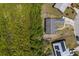 An aerial view showcasing a property adjacent to lush greenery for privacy and nature views at 1821 16Th E Ave, Bradenton, FL 34208