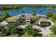 Luxury estate with beautiful landscaping, paver driveway and lake view at 18826 Ganton Ave, Lakewood Ranch, FL 34202