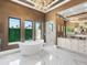 This oversized bathroom has a relaxing soaking tub, double sinks, and a stand-up shower at 18826 Ganton Ave, Lakewood Ranch, FL 34202