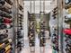 A beautiful wine cellar with racks holding various bottles of wine at 18826 Ganton Ave, Lakewood Ranch, FL 34202