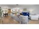 Spacious living room featuring hardwood floors, stylish furniture, and an open layout at 2647 Britannia Rd, Sarasota, FL 34231