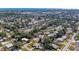 Picturesque aerial view of homes surrounded by verdant trees, offering a sense of tranquility and privacy at 2908 Mayflower St, Sarasota, FL 34231