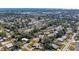 Picturesque aerial view of homes surrounded by verdant trees, offering a sense of tranquility and privacy at 2908 Mayflower St, Sarasota, FL 34231