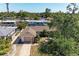 Charming single-story home featuring a brick driveway, attached garage, and well-maintained landscaping for curb appeal at 2908 Mayflower St, Sarasota, FL 34231