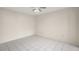 Bright bedroom with tile flooring and neutral-toned walls at 314 Oak Hill Way # 24, Sarasota, FL 34232