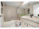Well-maintained bathroom with a combined tub and shower, vanity, offering a clean and functional design at 3360 Tallywood Ct # 7082, Sarasota, FL 34237