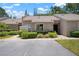 Inviting home with a tidy front yard and clearly marked parking area at 3360 Tallywood Ct # 7082, Sarasota, FL 34237