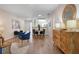 Open living space with modern decor and a view into the kitchen at 3360 Tallywood Ct # 7082, Sarasota, FL 34237