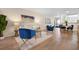 Spacious living area with open flow to the dining room and kitchen at 3360 Tallywood Ct # 7082, Sarasota, FL 34237