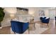 Comfortable living room featuring stylish seating arrangements and modern lighting at 3360 Tallywood Ct # 7082, Sarasota, FL 34237