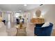 Bright living room features wood floors, neutral walls, and modern furniture at 3360 Tallywood Ct # 7082, Sarasota, FL 34237
