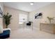 Bright office space with a sleek desk, decor and comfortable seating, providing a functional and stylish workspace at 3360 Tallywood Ct # 7082, Sarasota, FL 34237