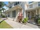 Charming home featuring manicured landscaping and a welcoming entryway, enhancing curb appeal and creating a warm invitation at 3405 54Th W Dr # 102, Bradenton, FL 34210