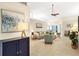 Open-concept living room featuring tile floors, neutral paint and contemporary decor at 3449 Yonge Ave, Sarasota, FL 34235