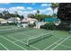 Enjoy tennis on well-maintained community courts surrounded by lush landscaping in a beautiful setting at 3449 Yonge Ave, Sarasota, FL 34235