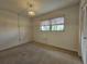 Cozy bedroom with natural light from the window and featuring a closet for storage at 390 301 W Blvd # 5B, Bradenton, FL 34205