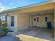 Covered carport with additional storage space and convenient access to the home at 390 301 W Blvd # 5B, Bradenton, FL 34205