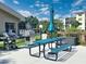 Outdoor picnic area with tables and barbecue grills, perfect for gatherings and enjoying outdoor meals at 390 301 W Blvd # 5B, Bradenton, FL 34205