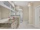 Elegant bathroom with granite counters, walk-in shower, and modern fixtures at 3931 Bay Shore Rd, Sarasota, FL 34234