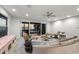 Cozy living room with sliding glass doors opening to scenic outdoor views and patio at 3931 Bay Shore Rd, Sarasota, FL 34234