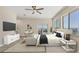 Serene main bedroom featuring a large window with views of the water and direct access to outdoor patio at 3931 Bay Shore Rd, Sarasota, FL 34234