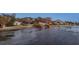 This idyllic waterfront property offers serene views and stunning natural surroundings and waterfront access at 3931 Bay Shore Rd, Sarasota, FL 34234