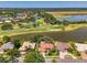 Beautiful single-story home boasts water and golf course views from the backyard at 407 Fieldstone Dr, Venice, FL 34292