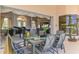 Charming dining room leading to a grand piano and inviting living spaces with tasteful decor at 407 Fieldstone Dr, Venice, FL 34292